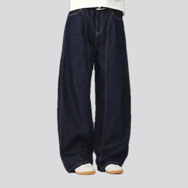 Slouchy 90s style dark men's jeans