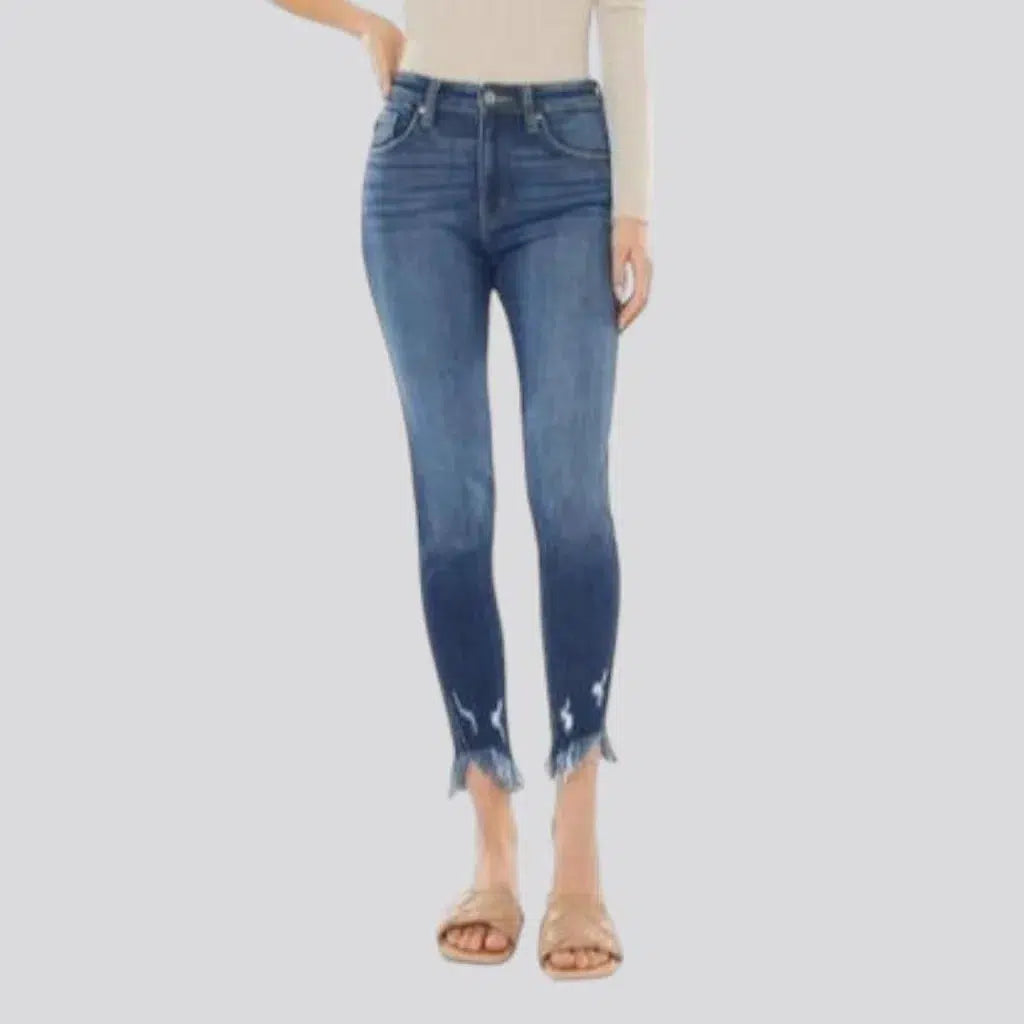 Medium-wash skinny jeans
 for ladies